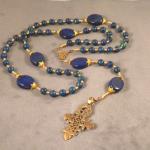 Azurite/Malachite (6mm), lapis oval Paters (20mm) with gold vermeil bead caps, aqccented with Swarovski crystals, Bronze casting of antique Ethiopean cross. $145.00 plus $5.20 S/H